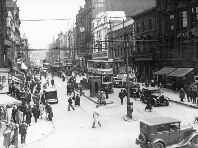 Trams at the junction of Boar Lane and Briggate in Leeds city centre