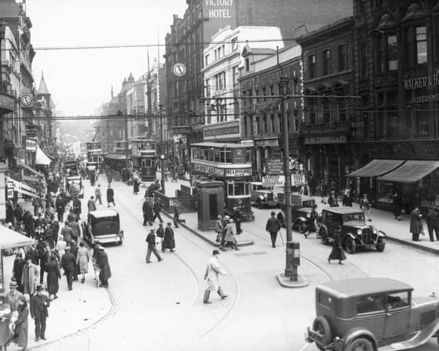 Trams at the junction of Boar Lane and Briggate in Leeds city centre