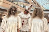 Freaky and fantastical: Creepy twins and a haunting clown prepare to stalk through Trinity Leeds during the first-ever Halloween Spooktacular Parade