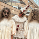 Freaky and fantastical: Creepy twins and a haunting clown prepare to stalk through Trinity Leeds during the first-ever Halloween Spooktacular Parade