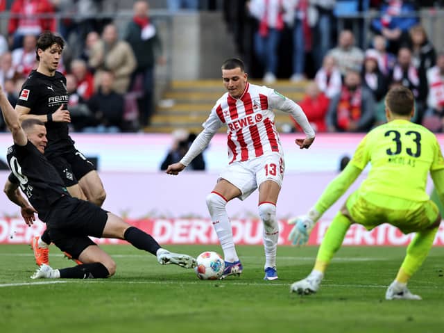 COMPARISON: Drawn by Leeds United defender Nico Elvedi, left, pictured in action for Borussia Monchengladbach against FC Koln.