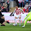 COMPARISON: Drawn by Leeds United defender Nico Elvedi, left, pictured in action for Borussia Monchengladbach against FC Koln.
