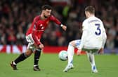 KEY MEN: Leeds United's Gabi Gudmundsson and Manchester United's Bruno Fernandes, pictured in April's historic win at Old Trafford.