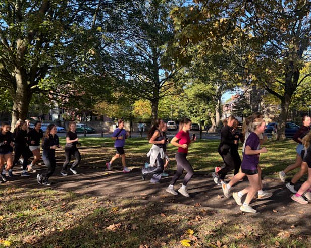 She Runs Leeds running through Woodhouse Moor on Saturday morning run
