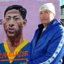 Robert Endeacott unveiling his latest mural - Gerry Francis, the first black player to play for Leeds United, which is on display at the new Fan Zone opposite the South Stand