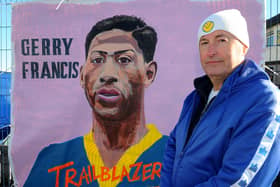 Robert Endeacott unveiling his latest mural - Gerry Francis, the first black player to play for Leeds United, which is on display at the new Fan Zone opposite the South Stand