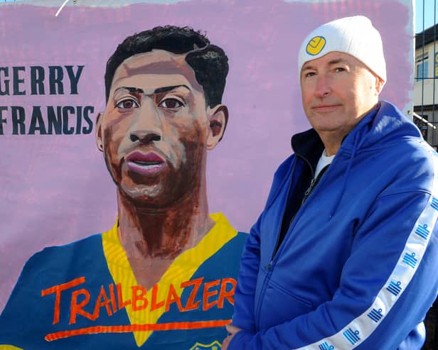 Robert Endeacott unveiling his latest mural - Gerry Francis, the first black player to play for Leeds United, which is on display at the new Fan Zone opposite the South Stand