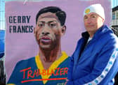 Robert Endeacott unveiling his latest mural - Gerry Francis, the first black player to play for Leeds United, which is on display at the new Fan Zone opposite the South Stand