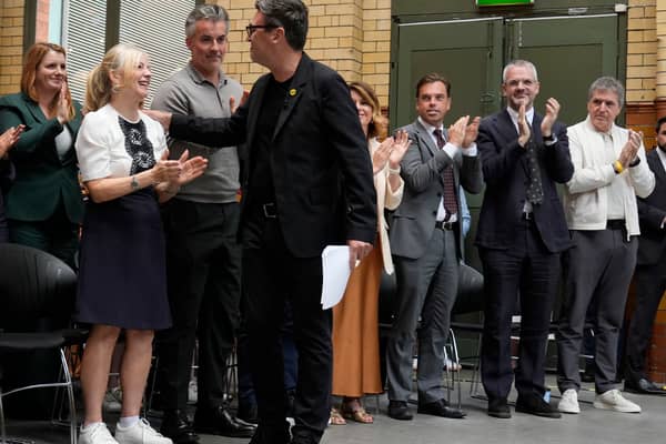 Andy Burnham, greets (left to right) Mayor of West Yorkshire Tracy Brabin.