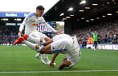KEY PAIR COMBINE: Tarik Muharemovic heads to celebrate with Dominic Calvert-Lewin after setting him up to draw Leeds United level against Manchester United at Elland Road.
