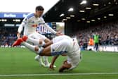 KEY PAIR COMBINE: Tarik Muharemovic heads to celebrate with Dominic Calvert-Lewin after setting him up to draw Leeds United level against Manchester United at Elland Road.