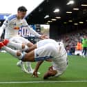 KEY PAIR COMBINE: Tarik Muharemovic heads to celebrate with Dominic Calvert-Lewin after setting him up to draw Leeds United level against Manchester United at Elland Road.