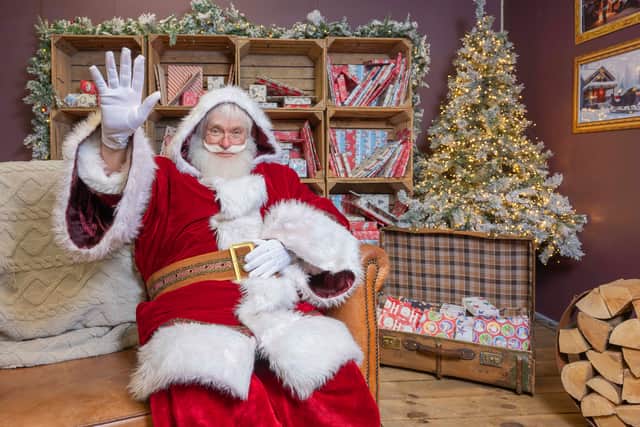 Father Christmas pictured inside his cosy log cabin at the Merrion Centre ahead of its return for Christmas 2026