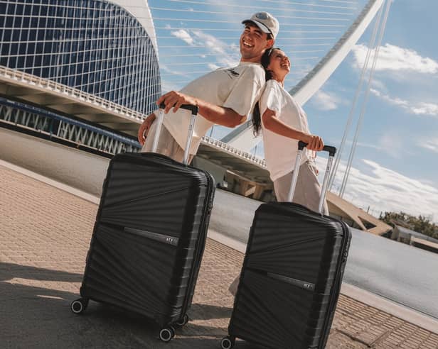 The black ATX Luggage 21-inch cabin suitcase has a 44-litre capacity, four double spinner wheels and a built-in TSA-approved lock.