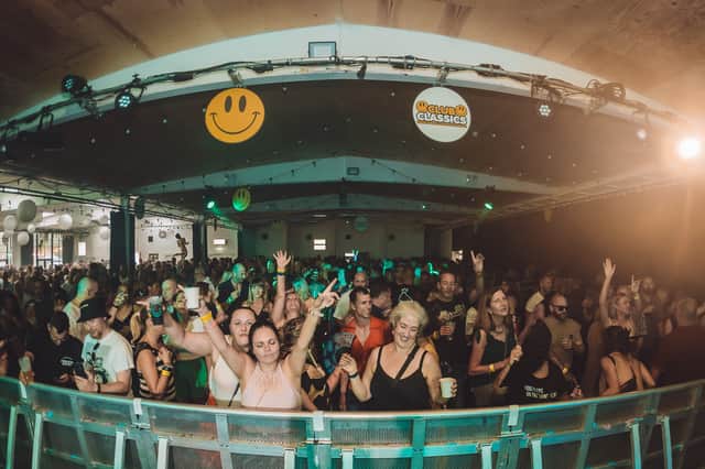 Clubbers dance under iconic 90s smiley faces as hit daytime rave Club Classics takes over Project House in Leeds