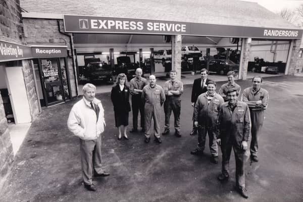 Peugeot main dealer Randerson of Horsforth was all geared up to give an even better service after work was completed on a £300,000 alteration and improvement scheme.. Pictured is Bob Randerson with his service staff.