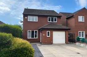 Set in a sought-after part of Colton, this detached home combines a generous driveway and integrated garage with a woodland outlook and a south-facing garden