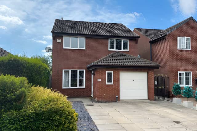 Set in a sought-after part of Colton, this detached home combines a generous driveway and integrated garage with a woodland outlook and a south-facing garden