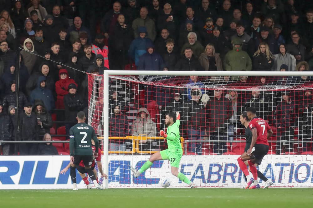 TROUBLED TIMES: Kyle Walker, left, looks on as Burnley fall behind to Lincoln City, the Clarets now on the hunt for a new manager and an ex-Leeds United favourite a frontrunner.
