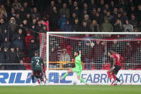 TROUBLED TIMES: Kyle Walker, left, looks on as Burnley fall behind to Lincoln City, the Clarets now on the hunt for a new manager and an ex-Leeds United favourite a frontrunner.