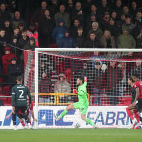 TROUBLED TIMES: Kyle Walker, left, looks on as Burnley fall behind to Lincoln City, the Clarets now on the hunt for a new manager and an ex-Leeds United favourite a frontrunner.