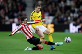 VERDICT: Of Leeds United point from Sunderland defender Trai Hume, left.