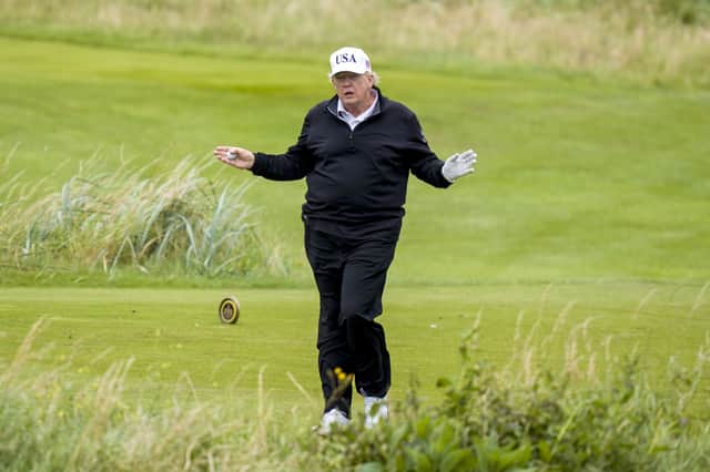 US President Donald Trump plays golf at his Trump Turnberry golf course in South Ayrshire