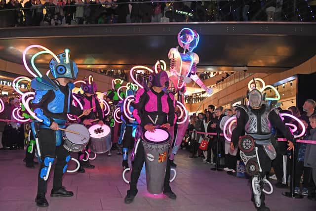 Controlled by a sparkly dancing robot queen, IOLA 2.0 and her Robots by Global Groovesl bring a futuristic party to Trinity Leeds.