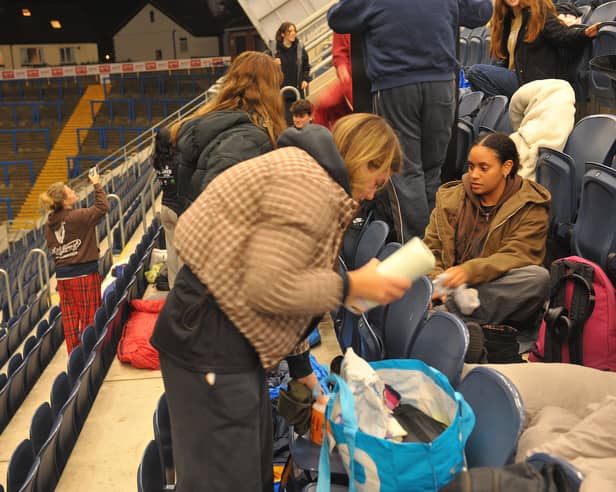Sleepers prepare for the night