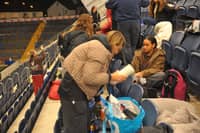 Sleepers prepare for the night