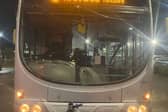 Police jumped off a bus to catch stone-throwing youths