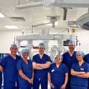 Nuffield Health Leeds Hospital's multidisciplinary theatre team with the da Vinci 5 robotic surgical system following the successful completion of the first week of robotic- assisted surgery.