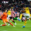 HOPE: Surrounding Leeds United winger Noah Okafor.