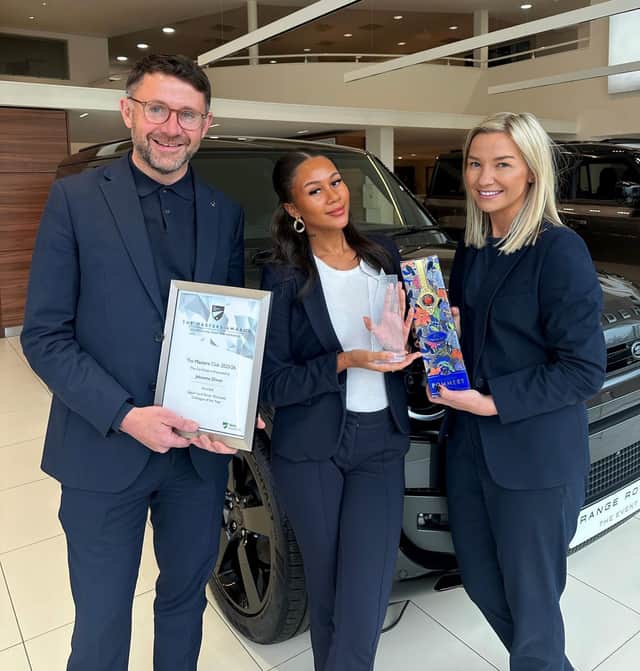 Jekeeme with Franchise Director Dan Evans and Land Rover Guiseley General Manager Emma Spedding