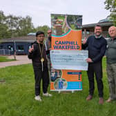 John Hudson of St Johns Masonic Lodge, presenting Cheque to Camphill special needs school Wakefield on behalf of West Riding of Yorkshire Masonic |Charities.