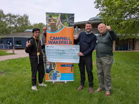 John Hudson of St Johns Masonic Lodge, presenting Cheque to Camphill special needs school Wakefield on behalf of West Riding of Yorkshire Masonic |Charities.