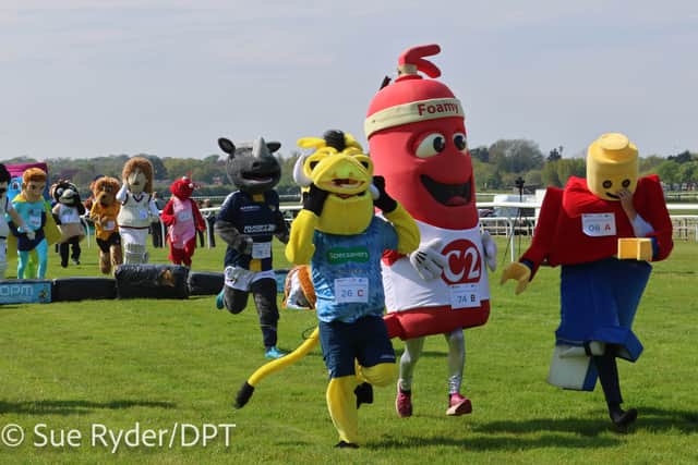 Battle for the line, Ronnie Rhino comes from behind to take second as both Foamy and St Neots Warthog take tumbles and Lego Man has to juggle to recatch his head before taking 3rd place.