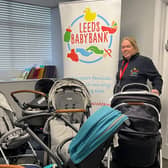 Leeds Baby Bank Unit Manager, Sarah Cohen, with just some of the many prams donated after last month's appeal.
