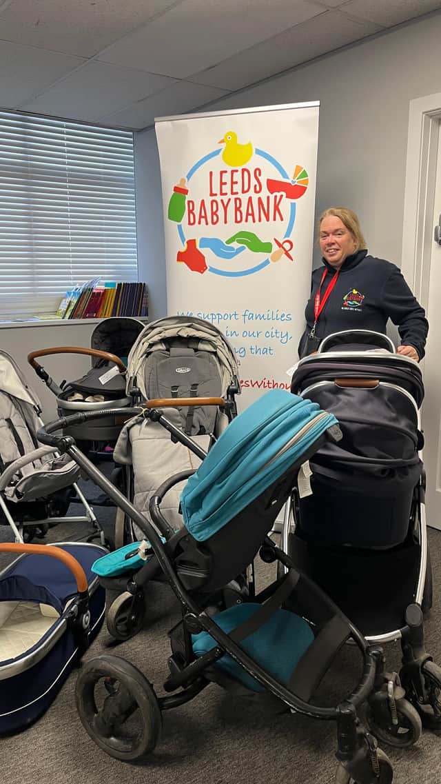 Leeds Baby Bank Unit Manager, Sarah Cohen, with just some of the many prams donated after last month's appeal.
