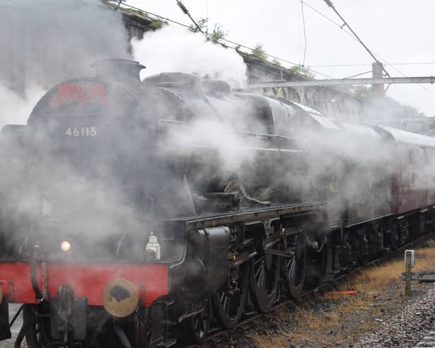 Letting off steam ... an engine called Scots Guardsman hauling the Dalesman train