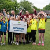 Methley Girls Under 9s cricket team being presented with their £500 equipment voucher.