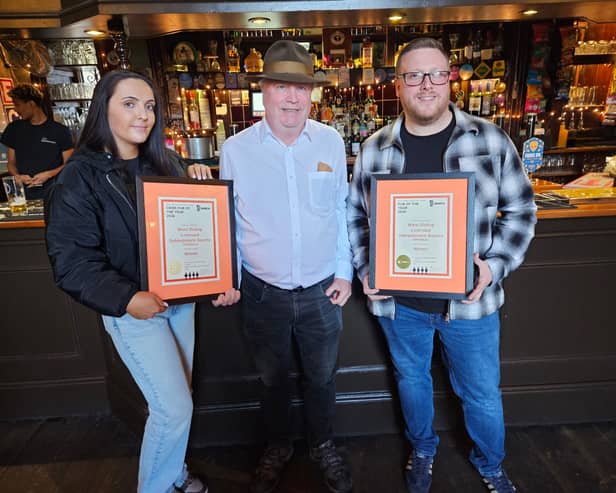Holly and Danny from the West Riding receive their awards from Mike Roebuck, Heavy Woollen branch chair