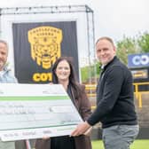 David Coe from Barratt and David Wilson Homes presenting Castleford Tigers Foundation with their cheque