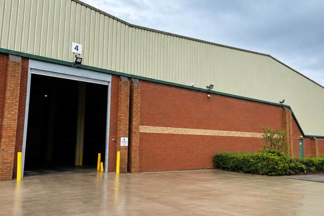 Outside the new warehouse