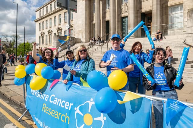 Suzy Aung (second from the right) volunteers with the Yorkshire Cancer Research cheer station team