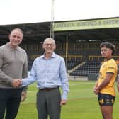 Craig Jeffels and Gavin Birch, with players of Castleford Tigers and Sam Wood, Sales Director.