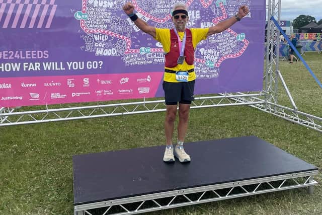 Mike celebrating completing the challenge