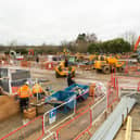 Works taking place on a busy construction site.