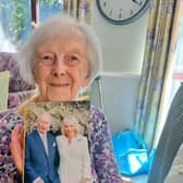 Evelyn with her card from The King