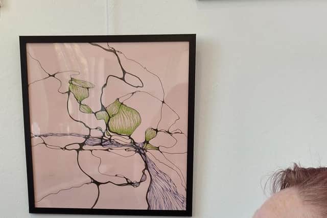 Doll with illustration 'Acceptance' from 'Take a Load Off'
